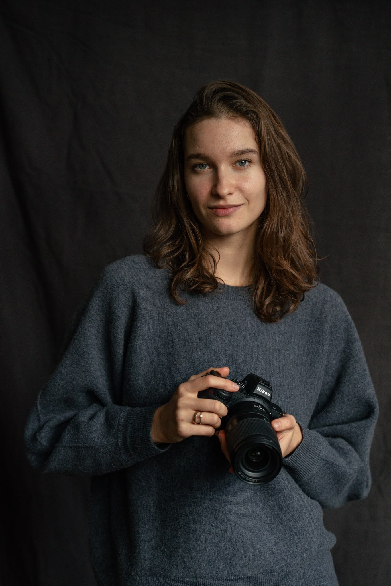 Anasta holding her camera